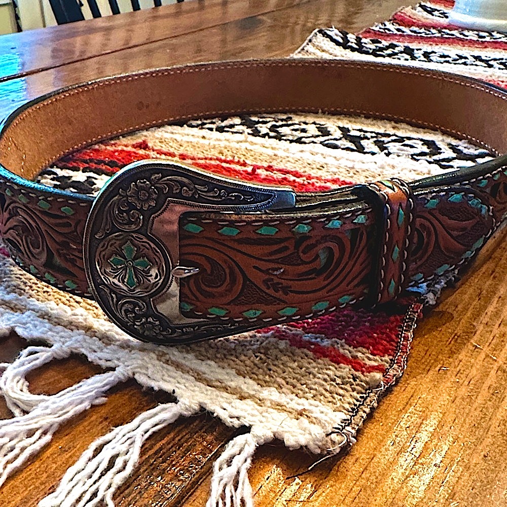 Women’s tooled hair hide western belt
